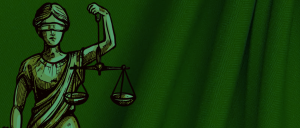 Imagem do símbolo da Justiça (deusa Têmis) sob filtro verde.