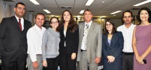 A mesa de abertura do evento: Miguel Braga, maestro do coral; Alessandro Borges, Diretor Geral de Administração (DGADM); o Corregedor-Geral da Justiça, desembargador Antonio José Azevedo Pinto e o desembargador Wagner Cinelli de Paula Freitas.
