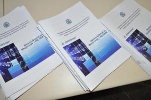 A cartilha com o treinamento do novo sistema.