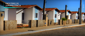 #ParaTodosVerem: Acima, no canto esquerdo, o texto “EMENTÁRIO DE JURISPRUDÊNCIA”.  Imagem de rua de paralelepípedo, com seis casas padronizadas, lado a lado. 