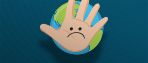 Imagem de uma mão aberta com uma cara zangada dentro dela e na frente de um globo terrestre